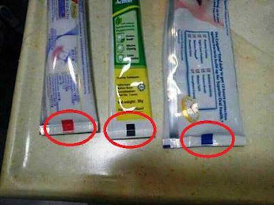 Le secret derrière la bande colorée de votre tube de dentifrice